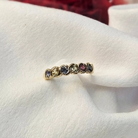 Златен пръстен от жълто злато с цветни сапфири