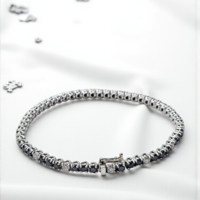 Тенис гривна с бели и черни диаманти