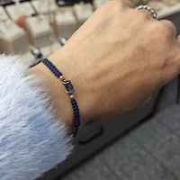 Гривна на конец с Топаз Лондон Блу и елементи от 18К злато Gumon