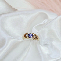 Златен пръстен с Танзанит и Диаманти