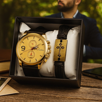 Мъжки комплект Geduo – елегантен часовник със златист циферблат и кожена гривна в подаръчна кутия
