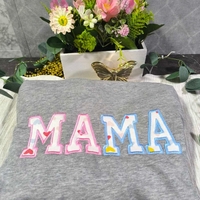 Суичър с апликация изработен от бебешки дрешки