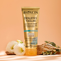 Крем за коса Bioxcin с 9 подхранващи масла от цветя и витамин В5