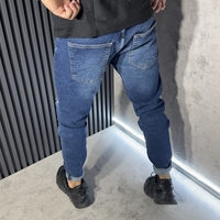 Дънки Slim Fit в Син Цвят с Леки Накъсвания