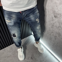 Мъжки Дънки в Синьо с Кръпки и Избелващ Ефект.