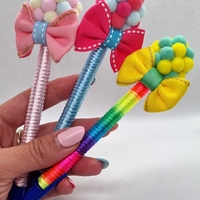 Химикал с помпони и панделка