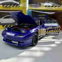 Метална кола с отварящи се врати, капаци, светлини и звуци Mazda RX7 1:24