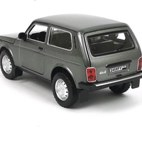 Метална кола с отварящи се врати капаци светлини и звуци Lada Niva 1:24