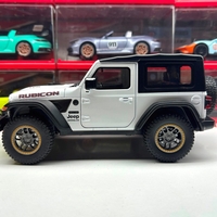 Метален джип с отварящи се врати капаци светлини и звуци Jeep Rubicon 1:18