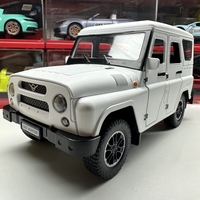 Метален джип с отварящи се врати капаци светлини и звуци UAZ 469 1:18