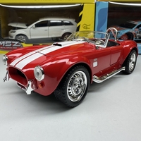 Метална кола с отварящи се врати капаци светлини и звуци Ford Shelby Cobra 427 1:24