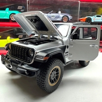 Метален джип с отварящи се врати капаци светлини и звуци Jeep Rubicon 1:18