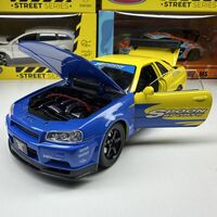 Метална кола с отварящи се врати, светлини и звуци Nissan Skyline GT-R 1:24