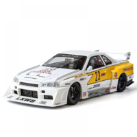Метална кола с отварящи се врати, светлини и звуци  Nissan Skyline GT-R R34 1:24