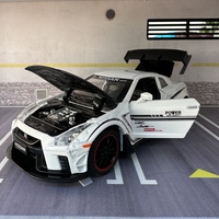 Метална кола с отварящи се врати, светлини и звуци Nissan GT-R Nismo 1:24