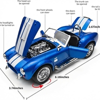 Метална кола с отварящи се врати капаци светлини и звуци Ford Shelby Cobra 427 1:24