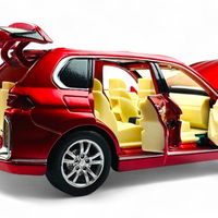 Метална кола с отварящи се врати капаци светлини и звуци BMW X7 1:24