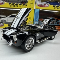 Метална кола с отварящи се врати капаци светлини и звуци Ford Shelby Cobra 427 1:24