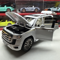 Метален джип с отварящи се врати капаци светлини и звуци Toyota Land Cruiser 1:18