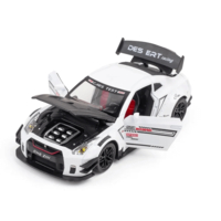 Метална кола с отварящи се врати, светлини и звуци Nissan GT-R Nismo 1:24