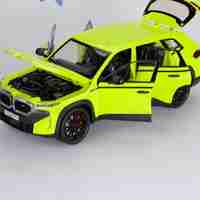 Метален джип с отварящи се врати капаци светлини и звуци BMW XM 1:24