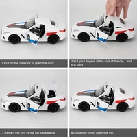 Метална кола с отварящи се врати и капаци светлини и звуци BMW Z4 M40i Motorsport 1:24