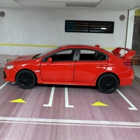 Метална кола с отварящи се врати капаци светлини и звуци Subaru Impreza 1:32