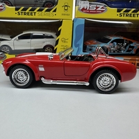 Метална кола с отварящи се врати капаци светлини и звуци Ford Shelby Cobra 427 1:24