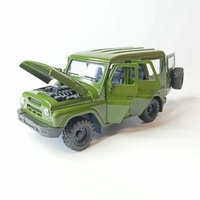 Метален джип с отварящи се врати капаци светлини и звуци UAZ 469 1:18