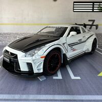 Метална кола с отварящи се врати, светлини и звуци Nissan GT-R Nismo 1:24