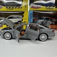 Метална кола с отварящи се врати светлини и звуци Audi A8 1:24