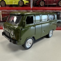 Метална кола с отварящи се врати капаци светлини и звуци UAZ 452 1:24