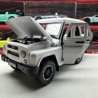 Метален джип с отварящи се врати капаци светлини и звуци UAZ 469 1:18