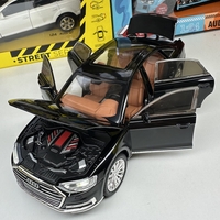 Метална кола с отварящи се врати светлини и звуци Audi A8 1:24