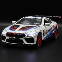 Метална кола с отварящи се врати капаци светлини и звуци BMW M8 1:32