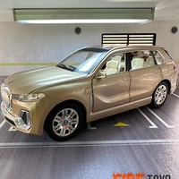Метална кола с отварящи се врати капаци светлини и звуци BMW X7 1:24