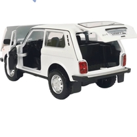 Метална кола с отварящи се врати капаци светлини и звуци Lada Niva 1:24