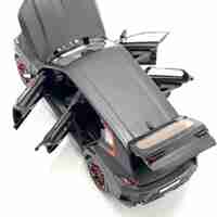 Метален джип с отварящи се врати капаци светлини и звуци BMW XM 1:24