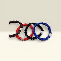 Плетена гривна с православен кръст – червена, черна и синя