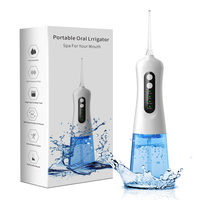 Irigator bucal si oral profesional Neo™ M208®, 140 PSI, portabil, 4 moduri de lucru, acumulator 1400mAh, multiple duze incluse, 300 ml, alb