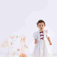 Rochiță din in cu fundițe, pentru fetițe model CLARA