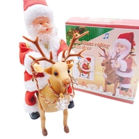 Decoratiune Mos Craciun, Flippy, Animat, care Canta si Danseaza, cu Saculet, pe Ren, Imbracat Festiv, 28x21x10 cm, Rosu