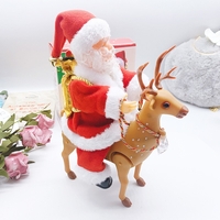 Decoratiune Mos Craciun, Flippy, Animat, care Canta si Danseaza, cu Saculet, pe Ren, Imbracat Festiv, 28x21x10 cm, Rosu