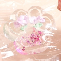 Jucarie Antistres Squishy, Flippy, Labuta de Pisica Pufoasa, cu Revenire Lenta, 7 x 6.5 cm, Model Flori 1, Transparent