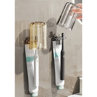 Suport Multifunctional 2 in 1, Pahar si Suport pentru Periuta de Dinti, Flippy, Plastic, Dimensiune: 10.4 x 7.3 x 7.3 cm, Gri