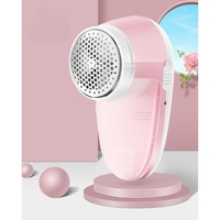 Aparat Pentru Curatat Scame, Par Si Praf, Flippy, Pentru Diferite Tipuri De Material, Cu Lame Din Otel Inoxidabil, Incarcare Prin USB Type-C, Cu Perie De Curatare si Cablu USB Incluse, 13x7 cm, Roz