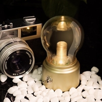 Lampa LED Decorativa sub forma de Bulb, Retro pentru interior, Bej/ Transparent, 5 V, 500 mA, ABS, Lumina Calda, Incarcare USB, Autonimie 12 Ore, Comutator Metalic, Flippy, 11x7x6 cm