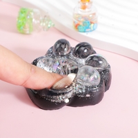 Jucarie Antistres Squishy, Flippy, cu Revenire Lenta, Squeeze Pinch Family, Model Labuta de Pisica cu Sclipici, 6.5x6 cm, 60g, Ambalaj Transparent, Alb-Negru