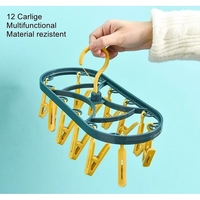 Uscator de Rufe Suspendat Flippy, cu 12 Carlige, Rotire 360 Grade, Protectie Vant, Mateiral Plastic, Usor de Depozitat, Multifunctional, 30 x 12.5 cm, Albastru/Galben