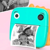Camera Instantanee pentru Copii, Flippy, Camera Frontala + Selfie, cu Functie de Printare, Cablu USB-C, Bluetooth, Compatibil iOS/Android, Model Dinozaur, Snur Inclus, Verde